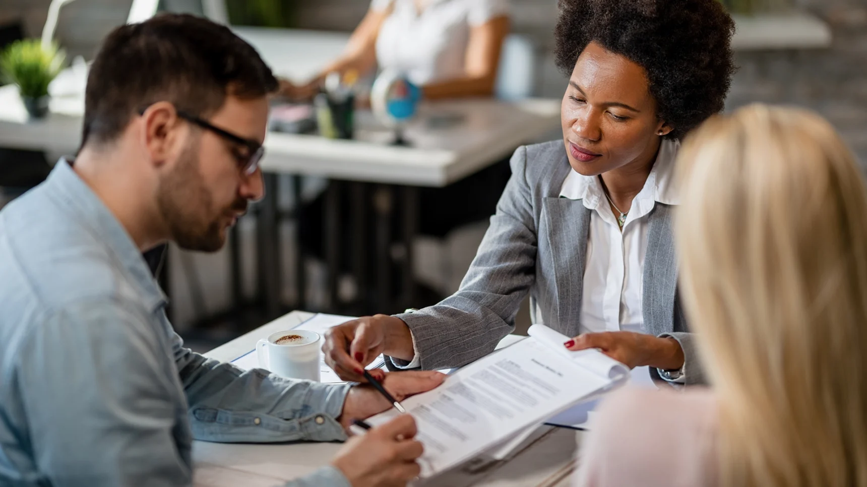 Woman showing couple paper work