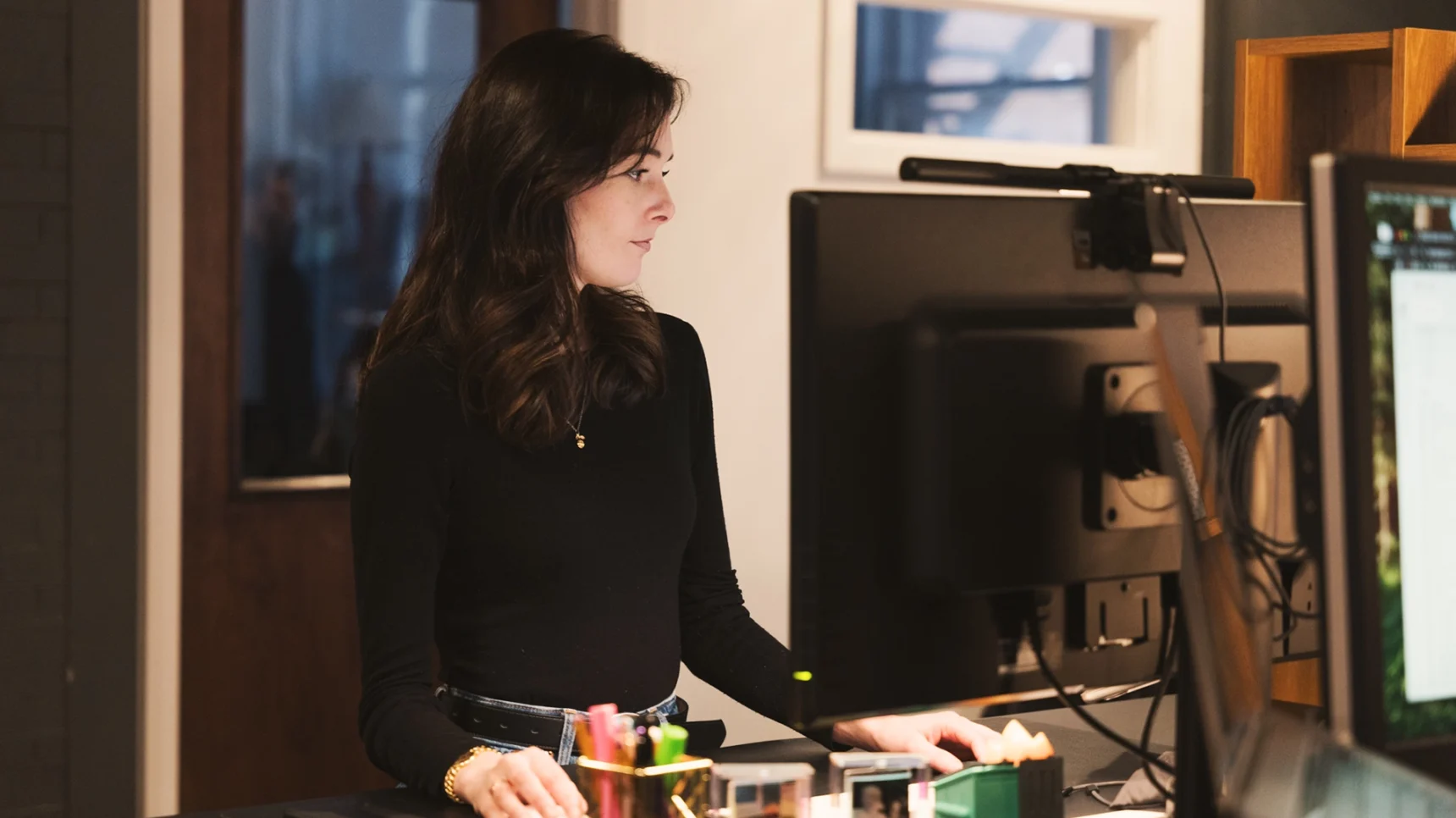 Emma working at standing desk