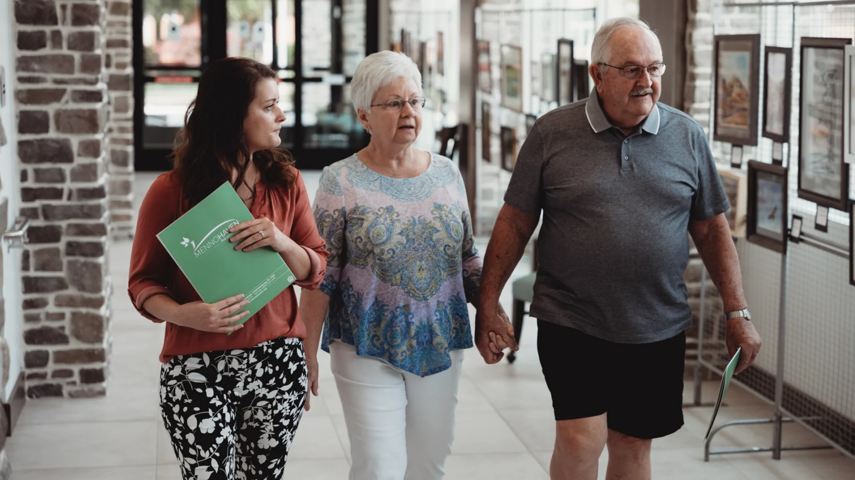 Couple lead by Menno Haven tour guide