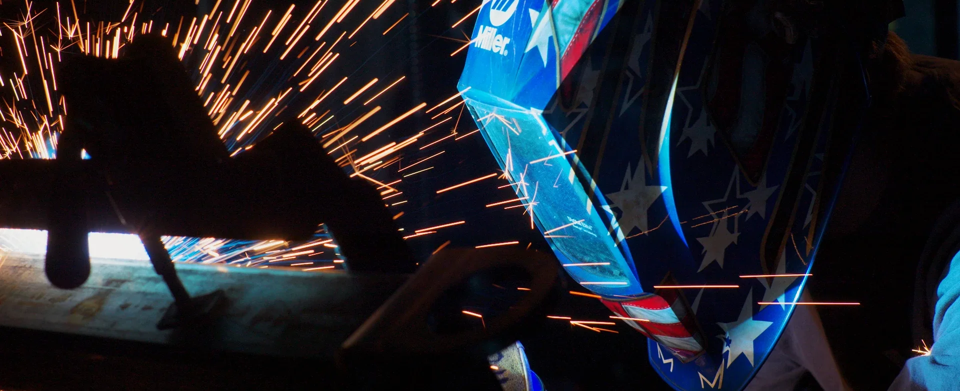 Man wearing mask and welding