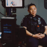 Officer sitting in front of camera